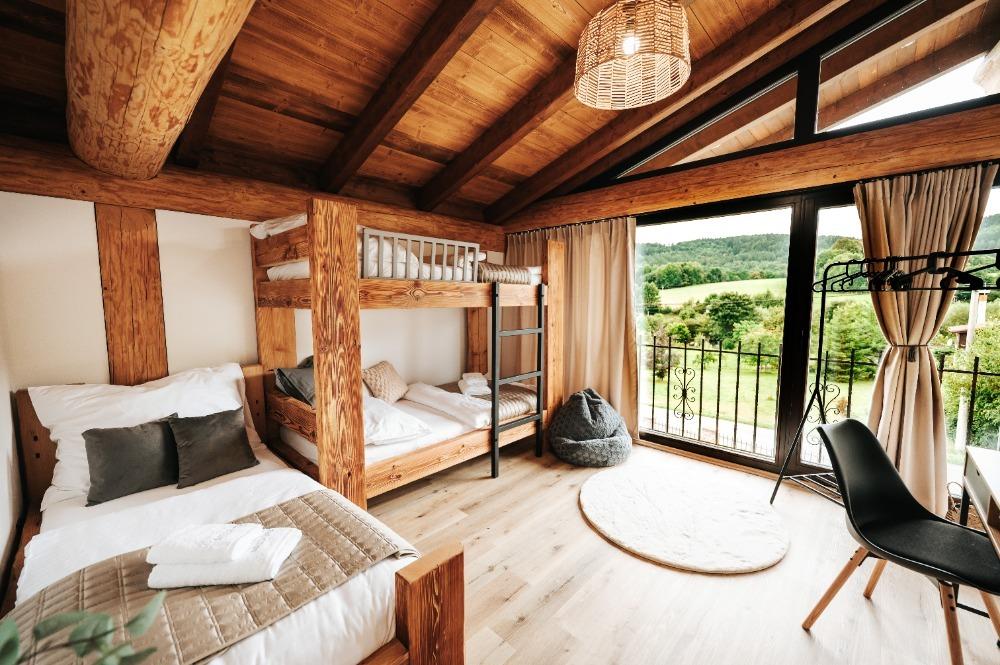 Dřevostavba Post and Beam - Meltoni, interiér; Dům měsíce srpna 2026 (Zdroj: Sruby Urban)